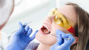Orthodontist Sunshine Coast performing dental checkup with professional orthodontic tools